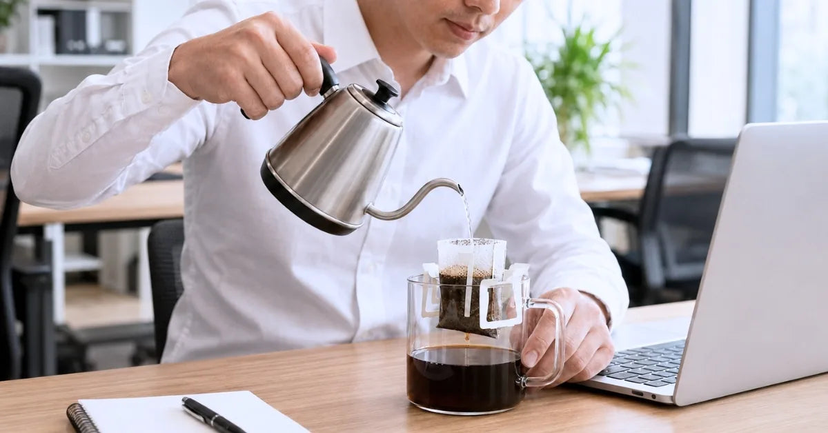 Pouring hot water from a gooseneck kettle into a KNDZ drip bag
