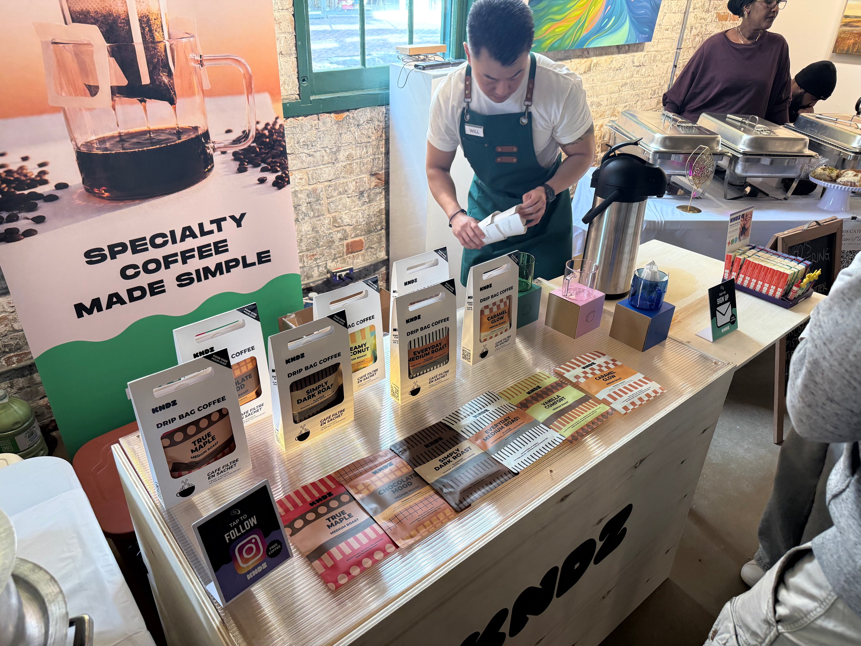 Founder Will setting up KNDZ COFFEE at an event in the Distillery District