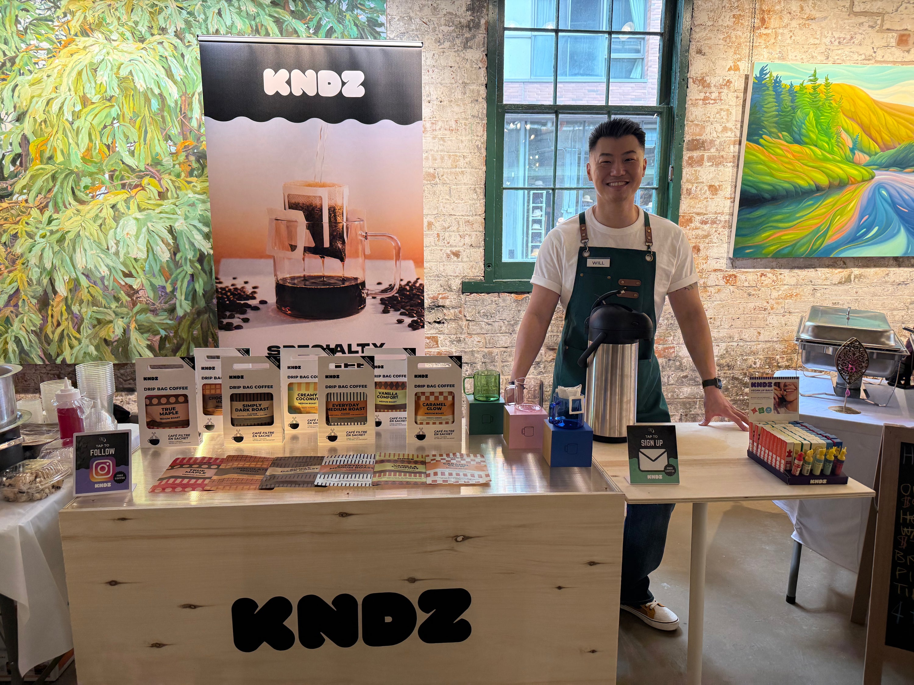 Founder Will in front of KNDZ COFFEE booth at Toronto's Distillery District Event